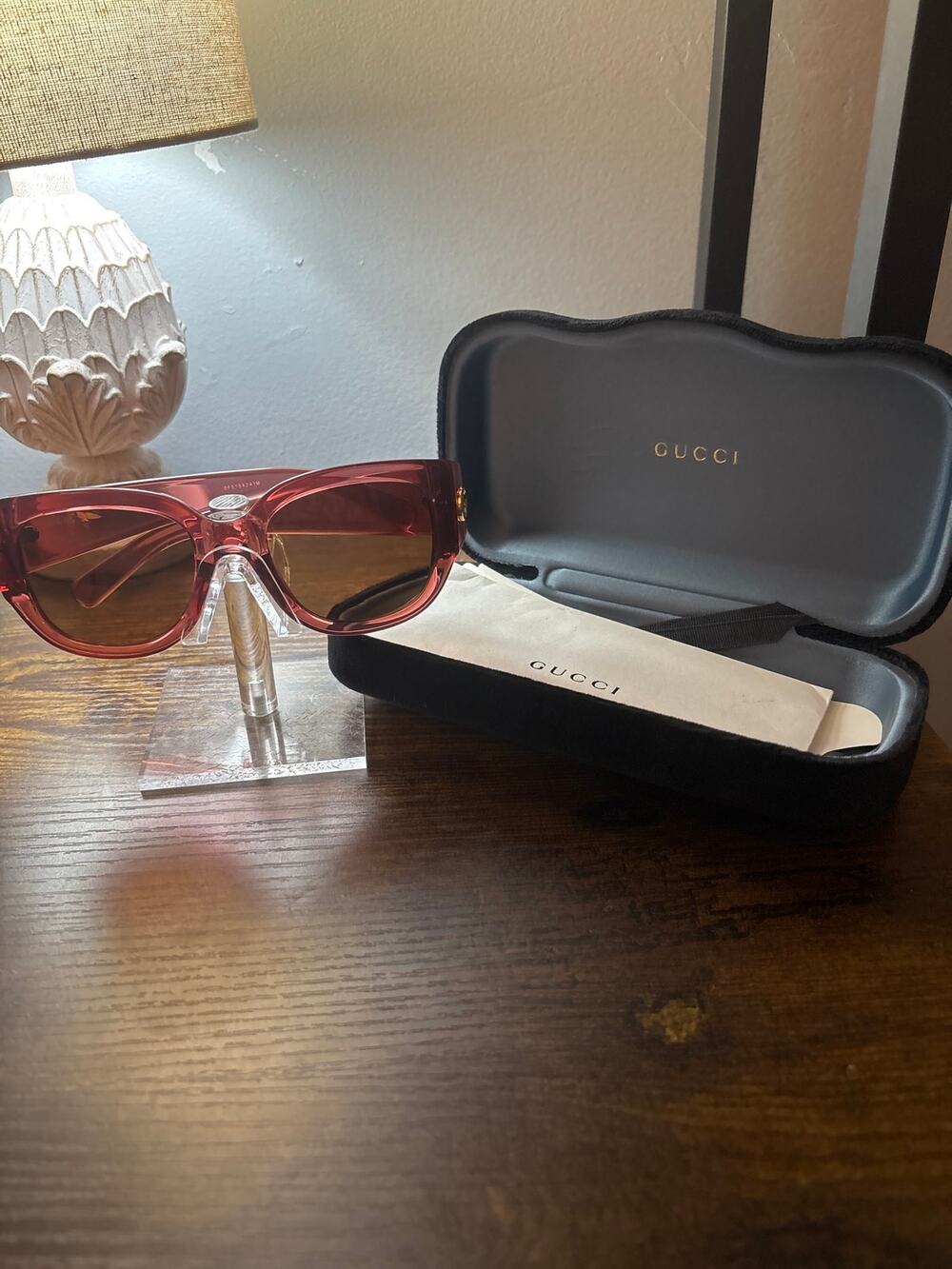 Gucci GG1599SA 003 sunglasses -bold transparent red frame & warm brown lenses.